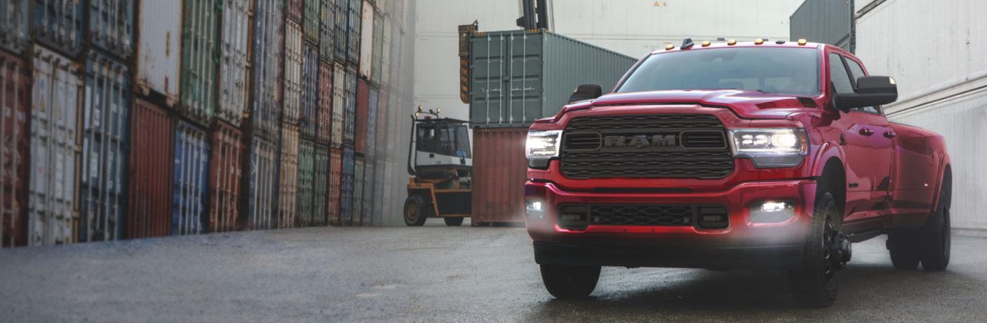 The 2022 Ram 3500 parked on a shipping dock.